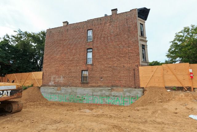 The construction site at 804 Jefferson Avenue, facing the townhouse that an engineer says excavation work is endangering.